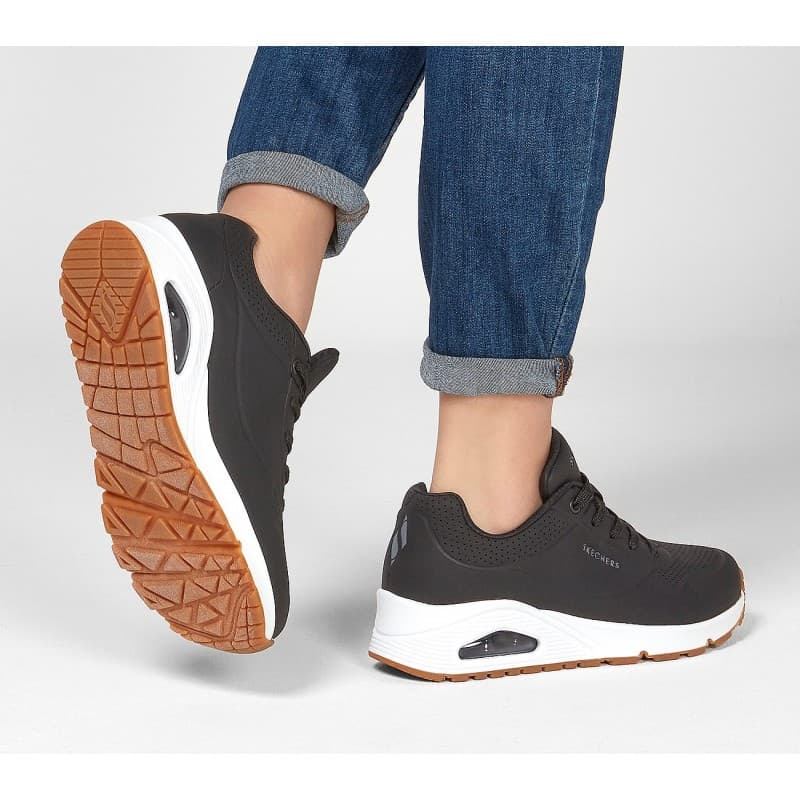 حذاء سكيتشرز أونو – ستاند اون اير للنساء لون أسود ونعل أبيض- Skechers Women's Uno - Stand on Air Shoes