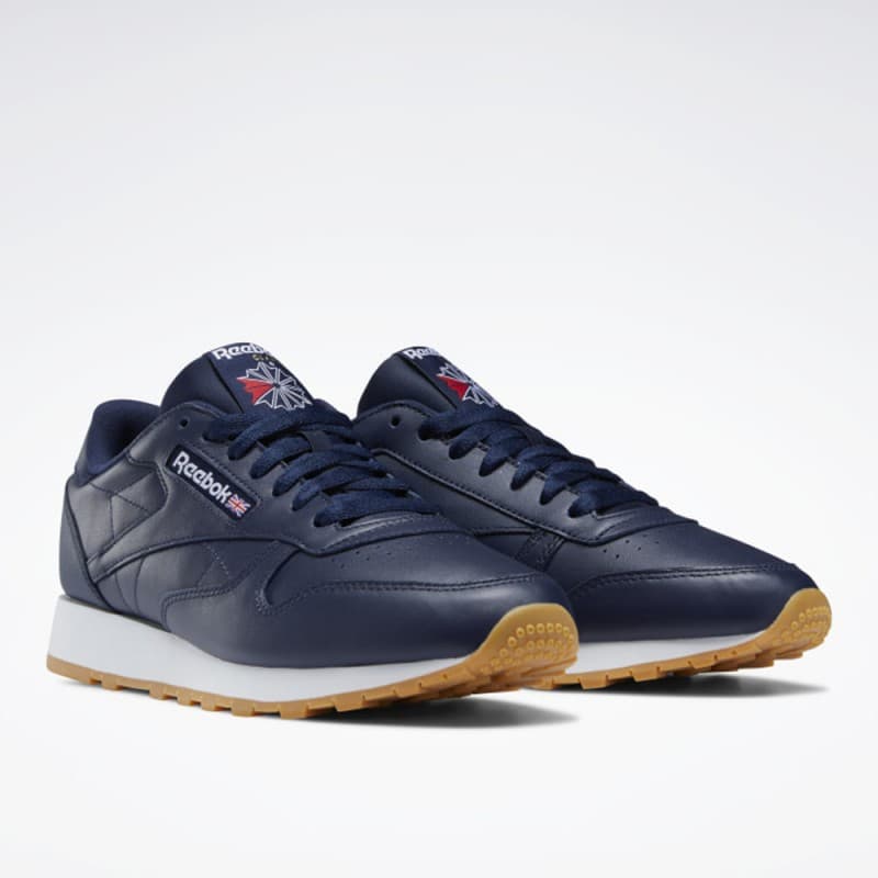 حذاء ريبوك كلاسيد ليذر للجنسين لون كحلي ونعل أبيض- Reebok Classic Leather Shoes