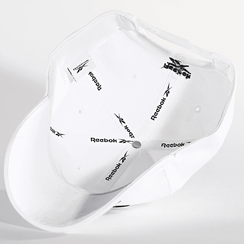 Reebok United By Fitness Baseball Hat طاقية ريبوك يونيتد باي فيتنس للجنسين لون أبيض 