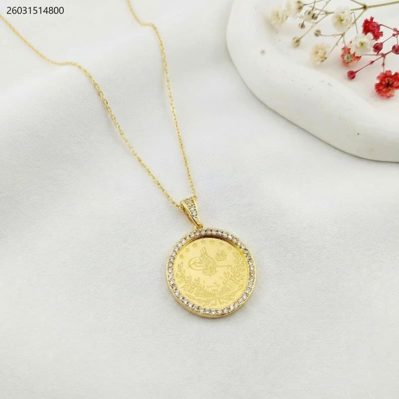 سنسال ليرة مع اطار زركون لون ذهبي